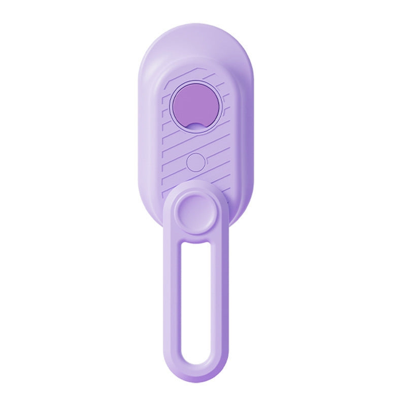 Purple Pawora misting brush for pet grooming