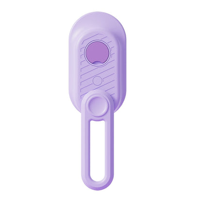 Purple Pawora misting brush for pet grooming